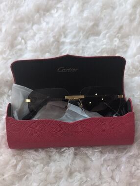 Cartier Men’s Rimless Sunglasses with Black Gradient Lenses and Gold Accents